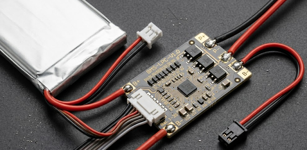 custom BMS circuit board connected to li-ion polymer battery pack with balance charger leads